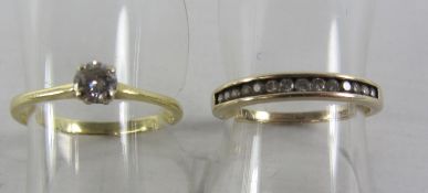 Single stone diamond ring hallmarked 18ct and a diamond channel set ring hallmarked 9ct