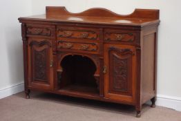 Edwardian walnut buffet side board fitted with four drawers and two cupboards,