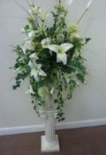 Classical style Urn on fluted Corinthian column base with silk flowers Condition Report