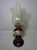 Ornate table lamp in the form of an oil lamp with hand finished decoration (This item is PAT tested