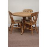 Pine circular top dining table raised on pedestal base fitted with three splay legs (D107cm, H78cm),