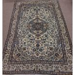 Fine Persian Nain beige and blue ground rug,