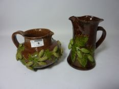 A Fredrick Masters Bognor Regis 'Hopware' jug and a Rye pottery vase with moulded leaves, marked 'R.