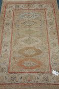 Old Persian hand knotted rug, repeating Gul design,