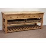 Rustic waxed dresser base fitted with three drawers, two vintage vegetable slides,