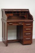 20th century oak tambour roll top desk, fitted with four drawers and slide, W92cm, H113cm,