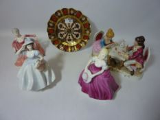 Three Coalport figurines another sculpture and Royal Crown Derby plate,