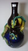 19th Century Burmantofts Faience bottle form vase with applied dragon,