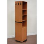 Swivel cherry wood cabinet fitted with cupboard, shelving,