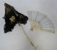 Late 19th century black lace and ivory silk parasol with ivory handle, H62cm,