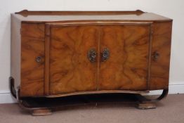 Mid 20th century walnut sideboard, fitted with centre double cupboard flanked by further cupboards,