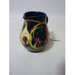 Moorcroft Queens Choice pattern jug, dated 2000, boxed,