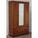 Edwardian satin walnut single wardrobe, enclosed by single mirror glazed door, with drawer to base,