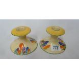 Pair of Clarice Cliff Bizzare Crocus pattern squat candle sticks,