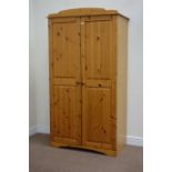 Pine double wardrobe enclosed by two panelled doors, W102cm, H188cm,