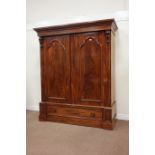 Large Victorian mahogany double wardrobe, two panelled doors enclosing hanging space,