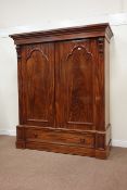 Large Victorian mahogany double wardrobe, two panelled doors enclosing hanging space,