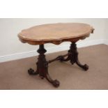 Late Victorian centre table, shaped figured walnut top, raised on carved rosewood base,