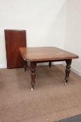 Victorian mahogany telescopic dining table with leaf, raised on turned reeded legs, H74cm,