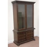 Spanish style stained oak display cabinet enclosed by two doors, above double cupboard, W103cm,
