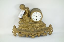 A late 19th century gilt spelter mantle clock, with enameled face, Roman numerals,