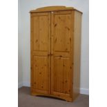 Pine double wardrobe enclosed by two panelled doors, W102cm, H188cm,
