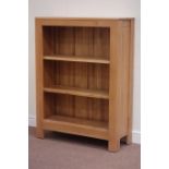 Solid oak bookcase fitted with two adjustable shelves, W90cm, H121cm,
