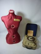 A Diana Autoset adjustable tailor's dummy and a Westminster record player,