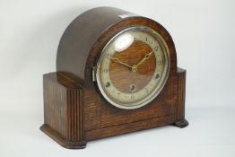 Oak finished Benting mantle clock, of arched form, silvered chapter ring, Arabic numerals,