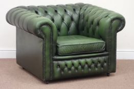 Chesterfield armchair upholstered in buttoned bottle green leather,