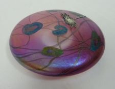 Glasform circular iridescent lily pad paperweight with a silver coloured dragonfly,