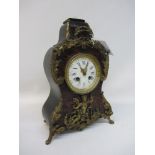 Late 19th century mantle clock, mounted by cherub finial,