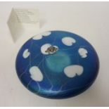 Glasform circular iridescent lily pad paperweight with a silver coloured frog,