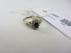 Sapphire and diamond cluster ring hallmarked 9ct Condition Report <a