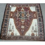 Persian hand-knotted Baluchi rug, cruciform medallion over beige ground, triple boarder (cut down),