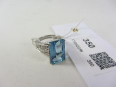 Emerald cut aquamarine on diamond set white gold split shank hallmarked 18ct aquamarine approx 6