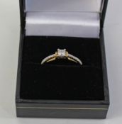 Diamond ring with diamond set band hallmarked 18ct Condition Report <a