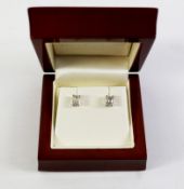 Pair diamond stud ear-rings stamped 750 approx 1 carat Condition Report <a