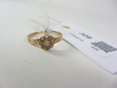 French gold set diamond and pearl cluster ring tested to at least 14k Condition Report
