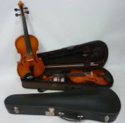 Two cased violins including bows,