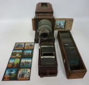Magic lantern with two boxes of slides and a set of eight nursery rhyme slides "Ten Little Nigger