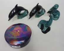 A collection of Poole pottery, two Dolphins,