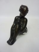 Bronze figure of a seated nude lady signed under arm GLH Condition Report <a
