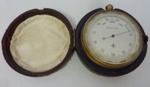 19th/ early 20th century compensated brass pocket barometer, inscribed R.L.