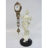 Junghans style mystery figure clock, the over painted figure of a young lady in flowing dress,