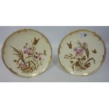 Two late 19th Century Derby plates with raised gilt decoration and enamel floral sprays