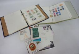 Two stamp albums and collection of 1st day covers Condition Report <a