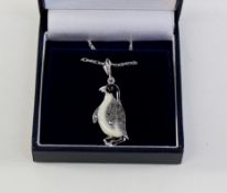 Marcasite and enamel penguin pendant necklace stamped 925 Condition Report <a
