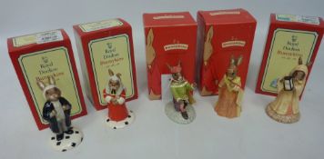 Five Royal Doulton Bunnykins - 'Sands of Time', 'Lawyer', 'Judge', 'Juliette' and 'Romeo',
