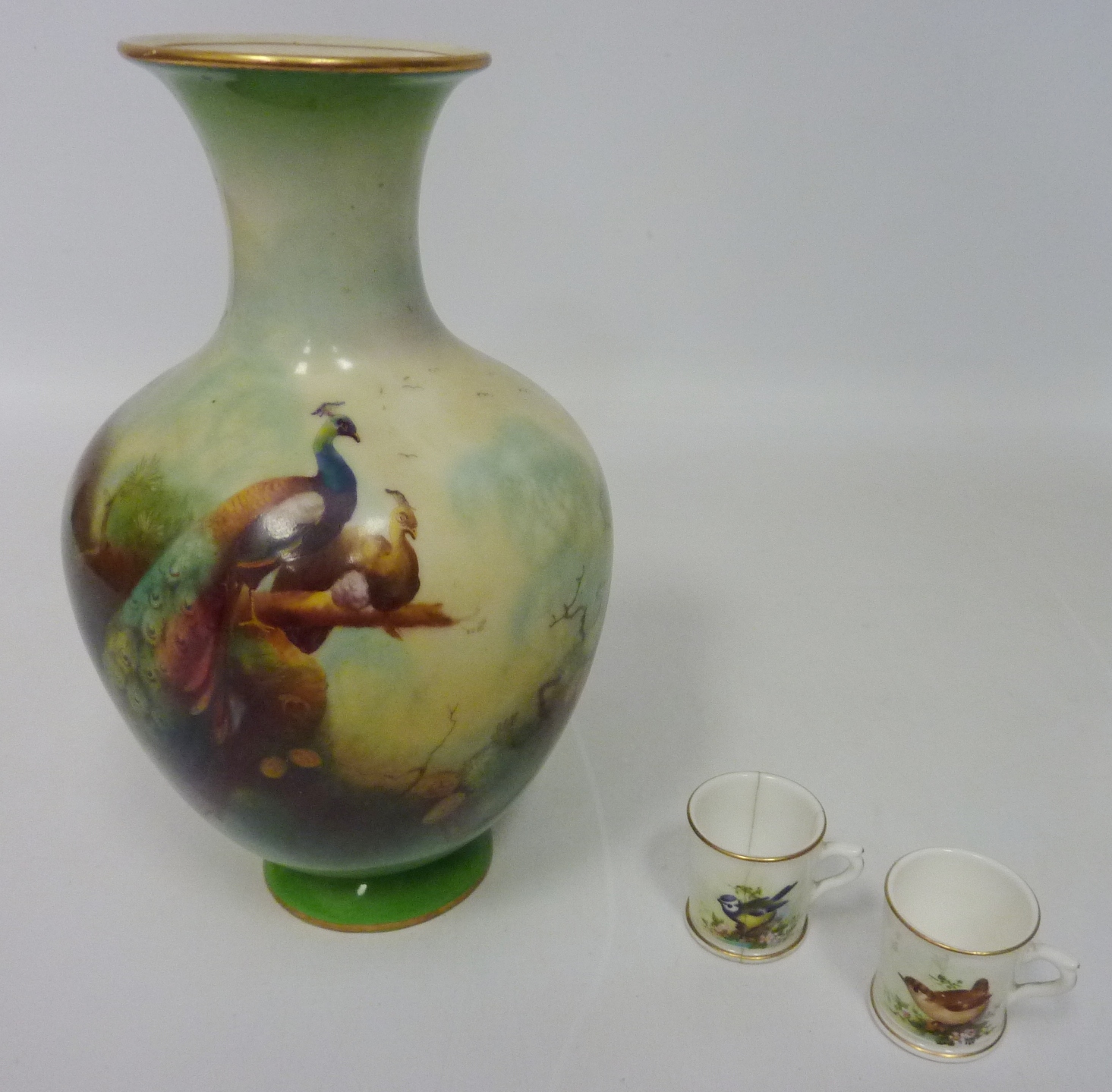 Royal Worcester vase decorated with a peacock and peahen on a branch, by C V White, shape no.